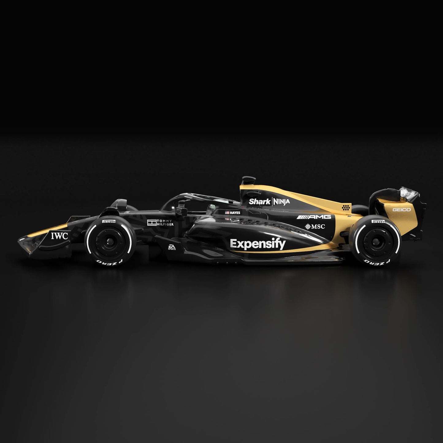 Black and gold Formula 1 car on a dark background