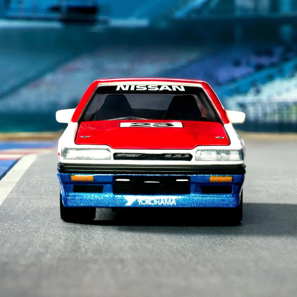 Model car with Nissan branding on a track