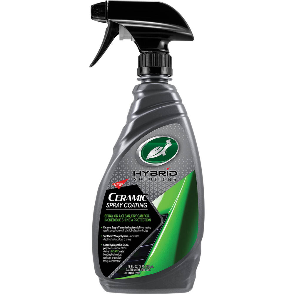 A bottle of Turtle Wax Hybrid Ceramic Spray Coating on a plain white background. The bottle is dark gray with a black spray trigger and features green and white branding.